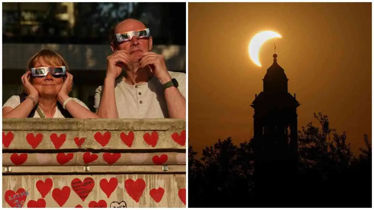 People in London watching the deep partial solar eclipse in the evening sky